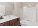 Functional bathroom features a vanity, toilet, and shower with sliding glass door at 6691 Beekman Pl, Zionsville, IN 46077