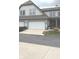 Charming townhome with a two-car garage and inviting curb appeal, blending comfort and convenience for modern living at 6691 Beekman Pl, Zionsville, IN 46077