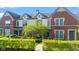 Beautifully landscaped multi-Gathering home with a mix of brick and shingle siding at 6691 Beekman Pl, Zionsville, IN 46077