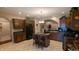 Spacious kitchen with dark cabinetry, center island, and an open layout; ideal for cooking and gathering at 6691 Beekman Pl, Zionsville, IN 46077