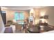 Bright living room with fireplace, window, and inviting seating area at 6691 Beekman Pl, Zionsville, IN 46077