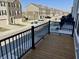 An exterior view from the balcony of the home showing neighborhood street at 6882 Equality Blvd, Carmel, IN 46033