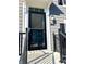 Gray home exterior featuring a black framed front door at 6882 Equality Blvd, Carmel, IN 46033