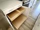 The kitchen boasts custom cabinetry with convenient pull-out drawers for efficient storage solutions at 6882 Equality Blvd, Carmel, IN 46033