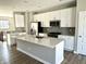 Kitchen pull-out cabinet organizer with multi-tiered wooden shelving for efficient storage solutions and optimal space usage at 6882 Equality Blvd, Carmel, IN 46033