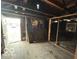 Interior room featuring exposed framing and outdoor access at 714 S Biltmore Ave, Indianapolis, IN 46241