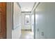 Hallway featuring blue accents, a window and natural lighting at 725 Queenswood Dr, Indianapolis, IN 46217