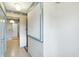 Hallway with carpet and access to a bedroom at 725 Queenswood Dr, Indianapolis, IN 46217