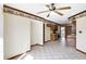 Open concept kitchen area featuring a tile floor and breakfast bar at 725 Queenswood Dr, Indianapolis, IN 46217