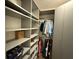 Organized closet with custom shelving and hanging racks at 7437 Vineyard Dr, Fishers, IN 46038