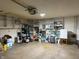 Garage with storage shelving and space for parking at 7437 Vineyard Dr, Fishers, IN 46038