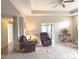 Expansive living room with neutral walls, plush carpeting, and views to entryway and an adjacent space at 7437 Vineyard Dr, Fishers, IN 46038