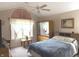 Primary bedroom with vaulted ceiling, carpet flooring and large window for natural light at 7437 Vineyard Dr, Fishers, IN 46038