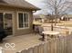 Cozy outdoor patio with a table and chairs, offering a great view and comfortable relaxation space at 7437 Vineyard Dr, Fishers, IN 46038