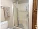 Clean, modern shower with glass doors and convenient grab bars at 7437 Vineyard Dr, Fishers, IN 46038