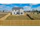 Spacious fenced backyard perfect for recreation and outdoor living at 7450 Leatherwood Dr, Indianapolis, IN 46259