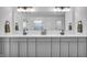 Bathroom with double sinks, modern fixtures, and lots of storage space at 7450 Leatherwood Dr, Indianapolis, IN 46259