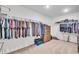 Spacious walk-in closet with an abundance of shelving for storage at 7450 Leatherwood Dr, Indianapolis, IN 46259