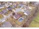 Aerial view of single Gathering homes showcasing one with an in-ground swimming pool at 8333 Hunters Meadow Ct, Indianapolis, IN 46259