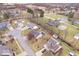 A high angle shot of a neighborhood featuring single Gathering homes and a pond at 8333 Hunters Meadow Ct, Indianapolis, IN 46259