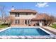 Inviting backyard features a sparkling in-ground pool, perfect for outdoor enjoyment and relaxation at 8333 Hunters Meadow Ct, Indianapolis, IN 46259