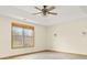 Spacious bedroom featuring a modern ceiling fan, recessed tray ceiling and natural light at 8333 Hunters Meadow Ct, Indianapolis, IN 46259