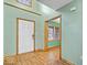 Inviting entryway features hardwood floors, a coat closet and bright white trim at 8333 Hunters Meadow Ct, Indianapolis, IN 46259