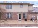 Back exterior elevation showing the brick, siding, patio, and pool at 8333 Hunters Meadow Ct, Indianapolis, IN 46259