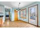 Open-concept kitchen with modern lighting and a clear view to the backyard and access to outside at 8333 Hunters Meadow Ct, Indianapolis, IN 46259