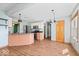 Bright and open-concept kitchen featuring granite countertops, stainless steel appliances and new floors at 8333 Hunters Meadow Ct, Indianapolis, IN 46259