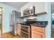 Kitchen featuring stainless steel appliances and granite countertops at 8333 Hunters Meadow Ct, Indianapolis, IN 46259