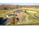 Stately brick home with well-manicured lawn and circular driveway at 8810 E 200 S, Zionsville, IN 46077