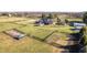 Expansive property featuring a brick home, paddocks, and outbuildings at 8810 E 200 S, Zionsville, IN 46077