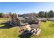 Aerial view showcasing backyard with patio and firepit at 8810 E 200 S, Zionsville, IN 46077
