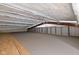 Spacious attic featuring a carpeted floor and visible insulation at 8810 E 200 S, Zionsville, IN 46077