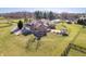 Aerial view of the estate's backyard, patio, fire pit, and a garage at 8810 E 200 S, Zionsville, IN 46077