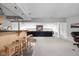 Open basement area with bar, lounging space, and media area at 8810 E 200 S, Zionsville, IN 46077
