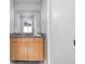 Bathroom featuring a vanity with granite countertop and a view through the door to another room at 8810 E 200 S, Zionsville, IN 46077