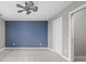 Bedroom featuring plush carpet and a modern ceiling fan at 8810 E 200 S, Zionsville, IN 46077
