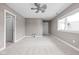 Bedroom features neutral walls, carpet, and a ceiling fan at 8810 E 200 S, Zionsville, IN 46077