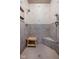 Shower with tile surround, built-in seat, shelving, and dual shower heads at 8810 E 200 S, Zionsville, IN 46077
