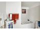 Bathroom bathtub view with white tub, towels and bathroom decor at 10270 Yosemite Ln, Indianapolis, IN 46234