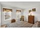 A carpeted bedroom has a bed, a window, a nightstand and a dresser at 10270 Yosemite Ln, Indianapolis, IN 46234