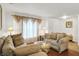 Comfortable living room featuring plush sofas, accent lighting, and stylish decor creating a cozy and inviting space at 10270 Yosemite Ln, Indianapolis, IN 46234