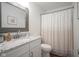 Stylish bathroom vanity featuring granite countertops and modern fixtures at 10920 Gate Cir, Fishers, IN 46038
