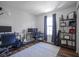 Bright office with desk, shelving, and hardwood floors at 10920 Gate Cir, Fishers, IN 46038