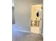 En-suite bathroom featuring a toilet, vanity, and neutral walls at 1103 Charleston Commons Dr, Anderson, IN 46012