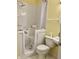 Bathroom with a step-in tub, toilet, and a pedestal sink at 1103 Charleston Commons Dr, Anderson, IN 46012