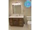 Bathroom with vanity, mirror, and octagon window at 1103 Charleston Commons Dr, Anderson, IN 46012