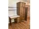 Convenient office nook with desk, cabinet and shelving in the kitchen at 1103 Charleston Commons Dr, Anderson, IN 46012